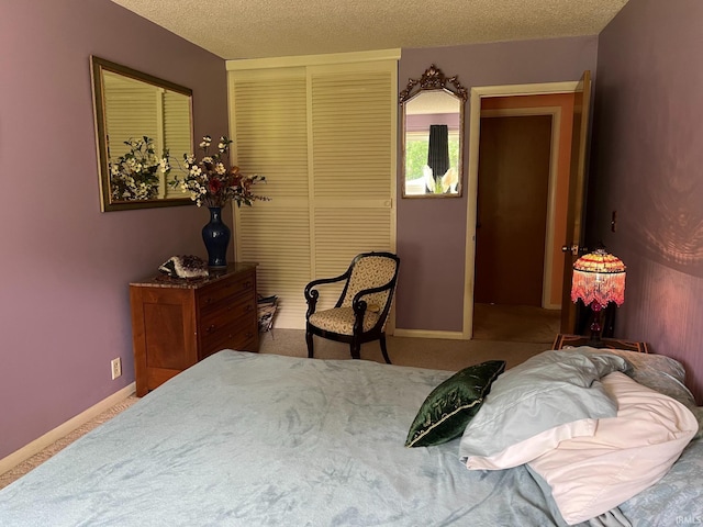 504 S Stratton Way, Decatur, IN 46733 - carpeted bedroom featuring a closet, baseboards, and a textured ceiling