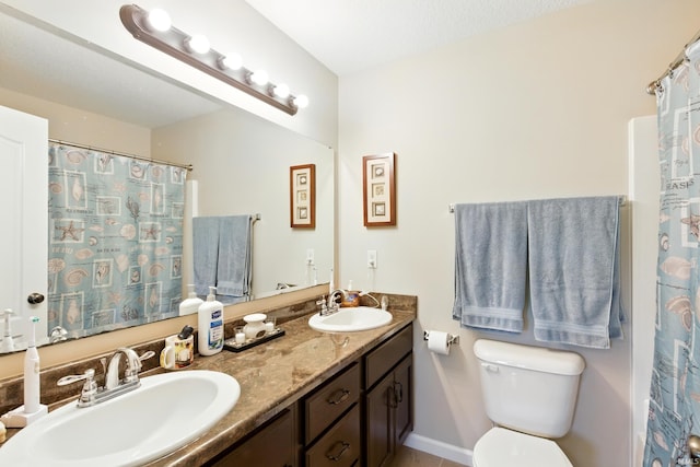 4679 Legacy Cv, Woodburn, IN 46797 - full bath with double vanity, toilet, baseboards, and a shower with shower curtain