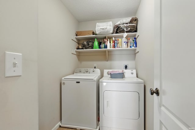 4679 Legacy Cv, Woodburn, IN 46797 - washroom with washer and dryer and a textured ceiling