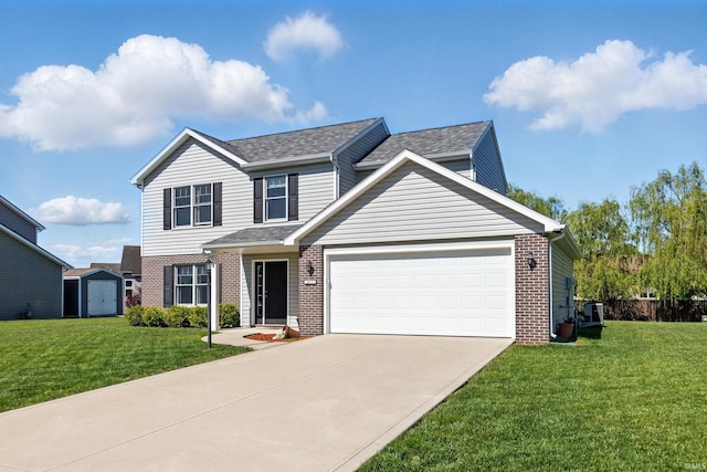 4679 Legacy Cv, Woodburn, IN 46797 - traditional-style home featuring brick siding, concrete driveway, a garage, and a front yard