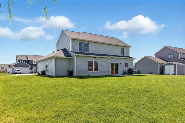 4679 Legacy Cv, Woodburn, IN 46797 - back of property featuring a yard and central air condition unit