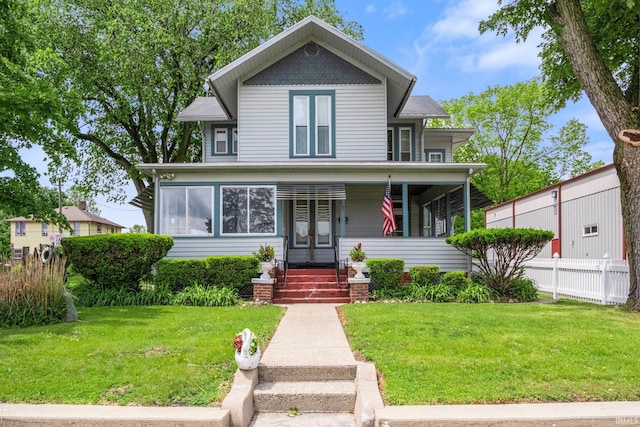 111 N State St, South Whitley, IN 46787 - victorian house featuring covered porch