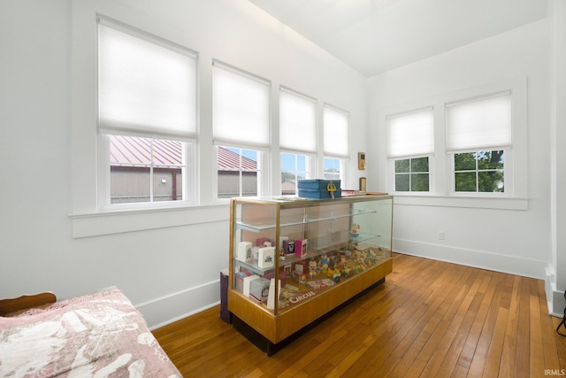 111 N State St, South Whitley, IN 46787 - bedroom featuring hardwood / wood-style floors and baseboards