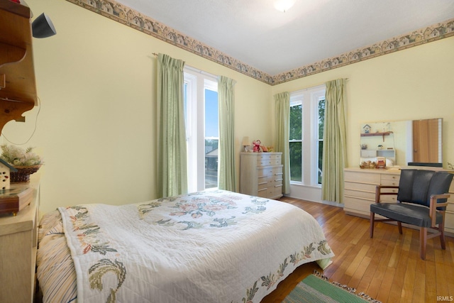 111 N State St, South Whitley, IN 46787 - bedroom featuring hardwood / wood-style floors