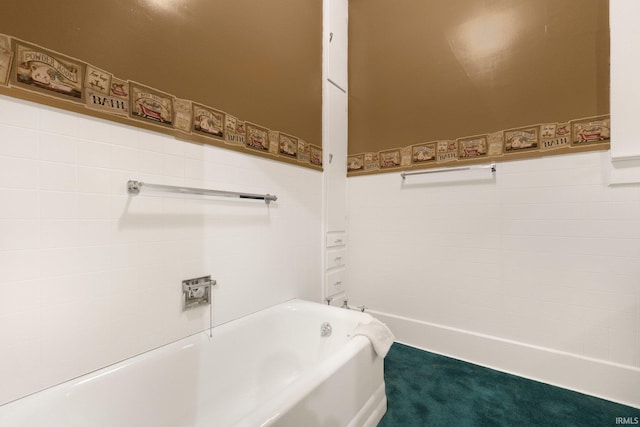 111 N State St, South Whitley, IN 46787 - bathroom with a bath and wainscoting
