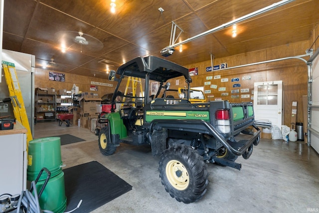 111 N State St, South Whitley, IN 46787 - garage featuring wood walls