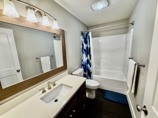 855 N Abigail Ln, Ellettsville, IN 47429 - full bath with toilet, vanity, shower / tub combo, and wood finished floors