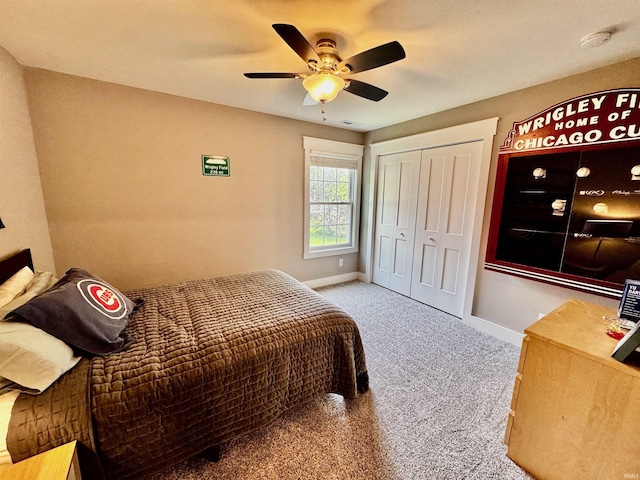 855 N Abigail Ln, Ellettsville, IN 47429 - bedroom featuring carpet, baseboards, a closet, and a ceiling fan