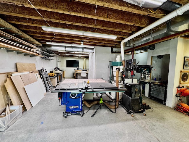 855 N Abigail Ln, Ellettsville, IN 47429 - unfinished basement featuring a workshop area