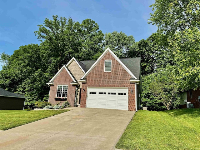 855 N Abigail Ln, Ellettsville, IN 47429 - traditional home featuring brick siding, concrete driveway, and a front yard