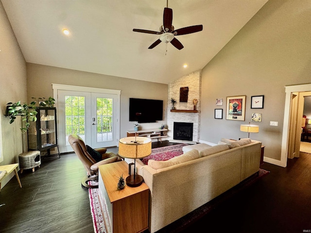 855 N Abigail Ln, Ellettsville, IN 47429 - living area featuring dark wood finished floors, baseboards, high vaulted ceiling, a ceiling fan, and a large fireplace