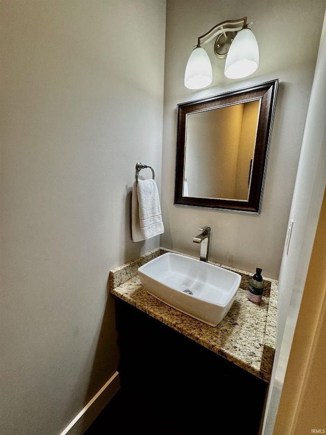 855 N Abigail Ln, Ellettsville, IN 47429 - bathroom with vanity and baseboards