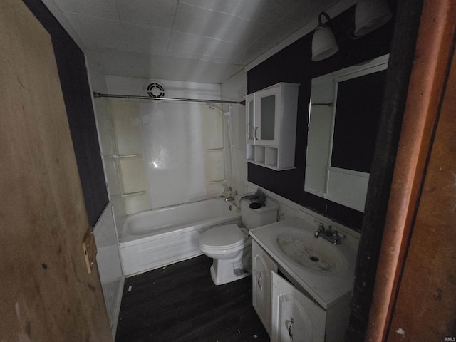 2710 W Virginia St, Evansville, IN 47712 - full bathroom with toilet, vanity, shower / tub combination, and wood finished floors