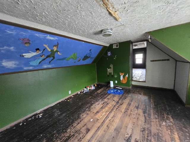 2710 W Virginia St, Evansville, IN 47712 - bonus room featuring wood-type flooring, vaulted ceiling, and baseboards