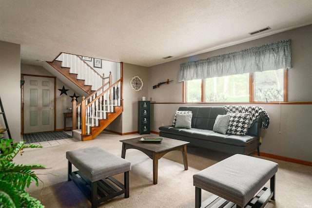 51410 Mansfield Dr, South Bend, IN 46628 - carpeted living area featuring stairs, baseboards, and a textured ceiling