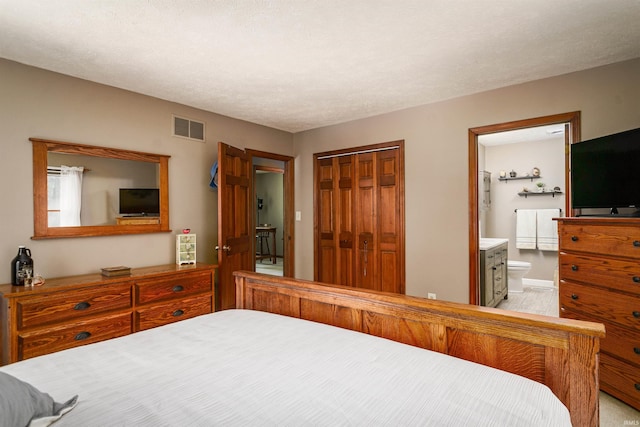 51410 Mansfield Dr, South Bend, IN 46628 - bedroom featuring a closet and connected bathroom