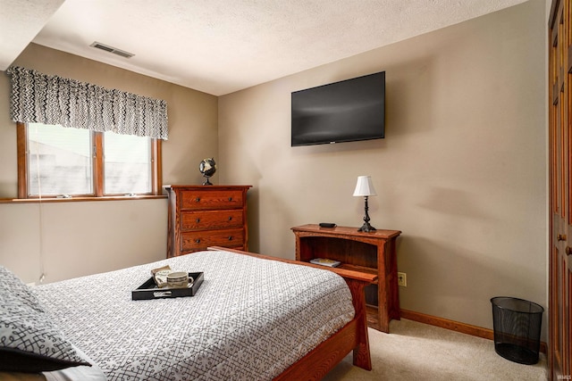 51410 Mansfield Dr, South Bend, IN 46628 - carpeted bedroom with baseboards and a textured ceiling