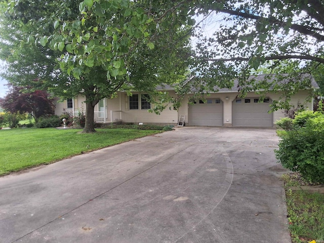 5454 Ski Dr, Loogootee, IN 47553 - view of front of property with driveway, a front lawn, and a garage