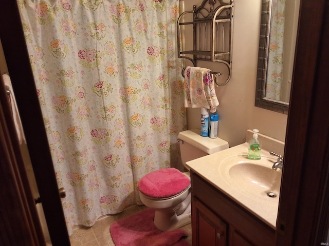 5454 Ski Dr, Loogootee, IN 47553 - bathroom with toilet, vanity, curtained shower, and tile patterned flooring