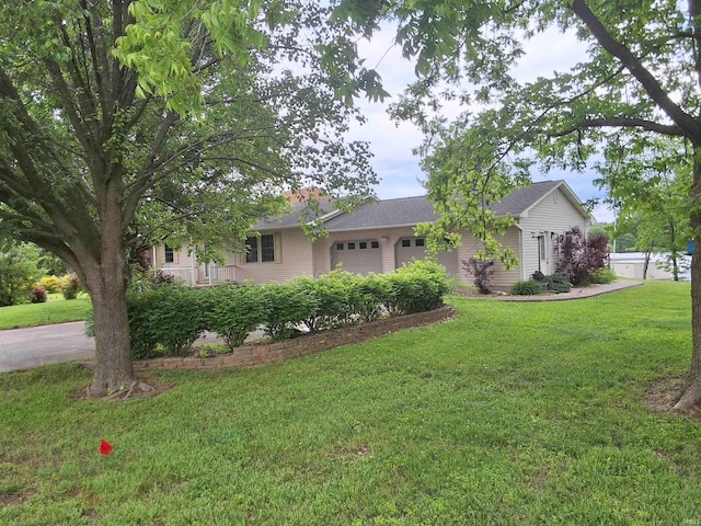 5454 Ski Dr, Loogootee, IN 47553 - ranch-style home with an attached garage and a front yard