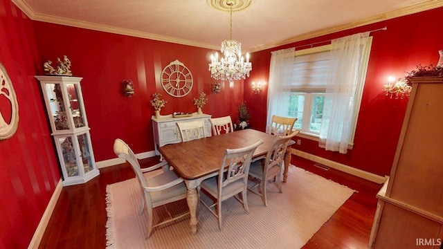 3043 N 400 E Xrd, Monticello, IN 47960 - dining room featuring a chandelier, baseboards, wood finished floors, and crown molding