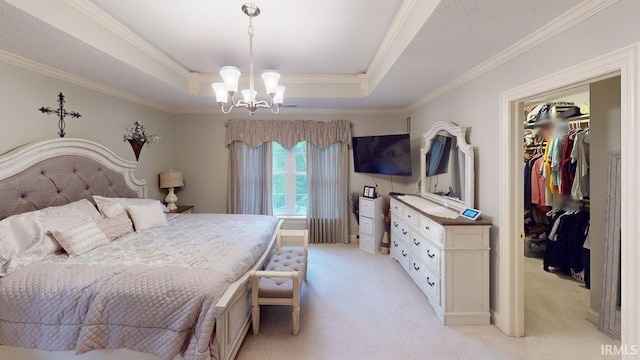 3043 N 400 E Xrd, Monticello, IN 47960 - bedroom featuring a chandelier, light carpet, ornamental molding, a walk in closet, and a tray ceiling