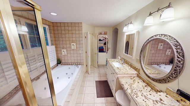 3043 N 400 E Xrd, Monticello, IN 47960 - bathroom featuring tile patterned flooring, vanity, and a whirlpool tub