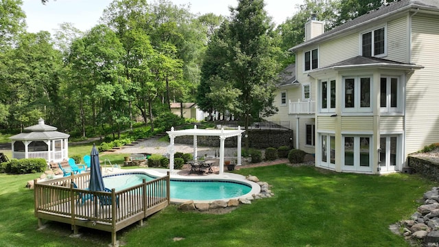 3043 N 400 E Xrd, Monticello, IN 47960 - outdoor pool featuring a gazebo, a pergola, a lawn, and view of wooded area