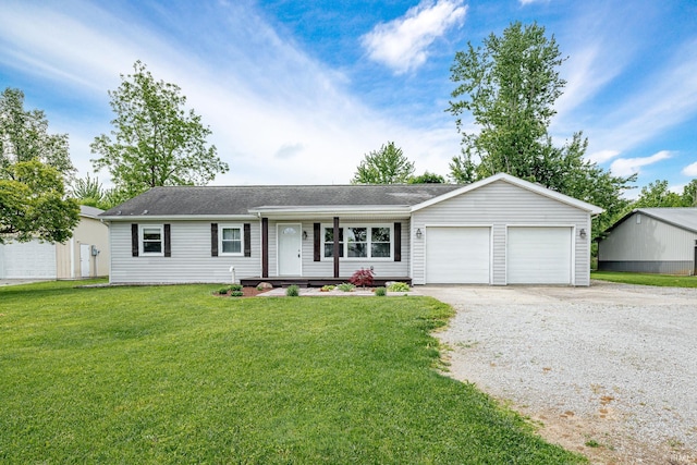 650 E Spear Rd, Columbia City, IN 46725 - ranch-style house featuring driveway, a garage, and a front yard