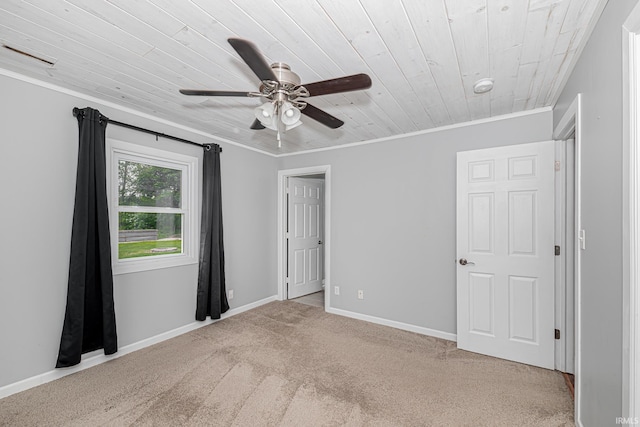 650 E Spear Rd, Columbia City, IN 46725 - unfurnished bedroom featuring crown molding, carpet, wood ceiling, a ceiling fan, and baseboards