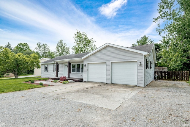 650 E Spear Rd, Columbia City, IN 46725 - ranch-style home featuring a garage, concrete driveway, and roof with shingles