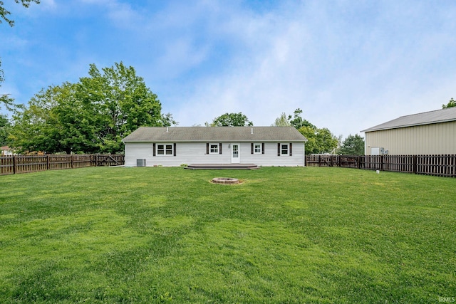 650 E Spear Rd, Columbia City, IN 46725 - rear view of property with central AC and a fire pit