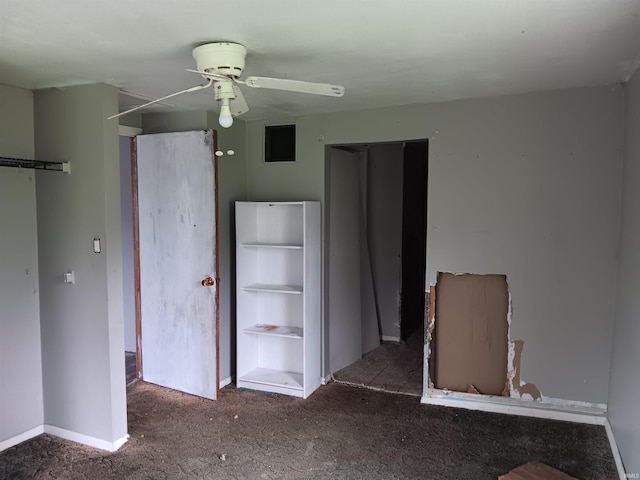 89 Mason St, Bedford, IN 47421 - unfurnished bedroom featuring carpet flooring, baseboards, and a ceiling fan