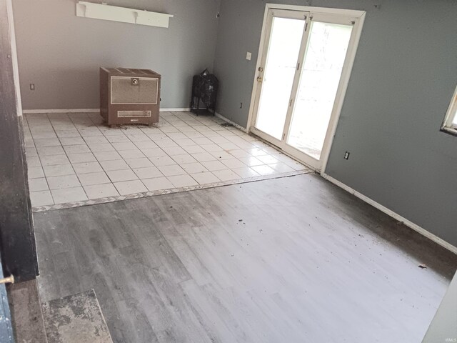 89 Mason St, Bedford, IN 47421 - spare room featuring plenty of natural light, baseboards, and wood finished floors