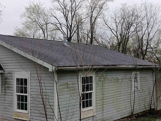89 Mason St, Bedford, IN 47421 - view of side of property with a shingled roof