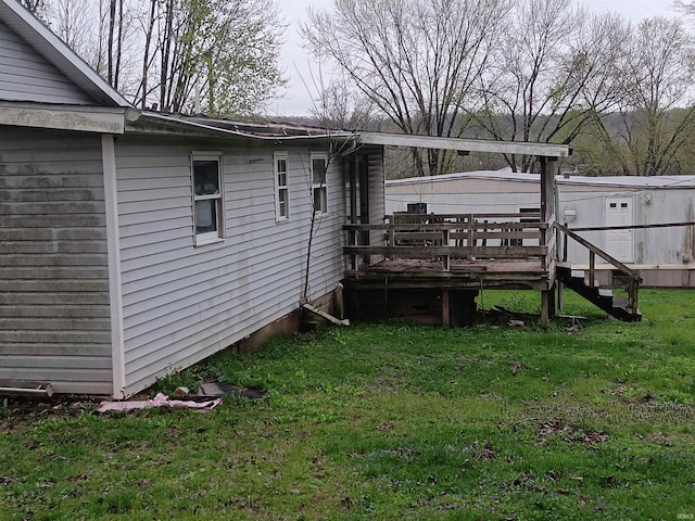 89 Mason St, Bedford, IN 47421 - view of grassy yard with a wooden deck