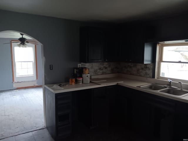 89 Mason St, Bedford, IN 47421 - kitchen with a sink, healthy amount of natural light, arched walkways, and light countertops