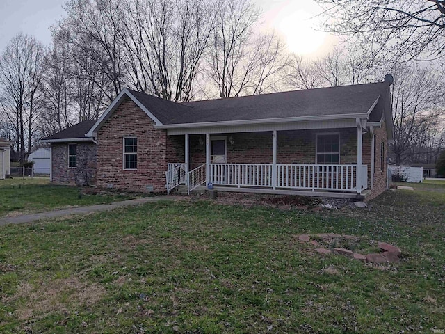 503 S Leavitt St, Brazil, IN 47834 - ranch-style house with brick siding, a porch, and a front yard