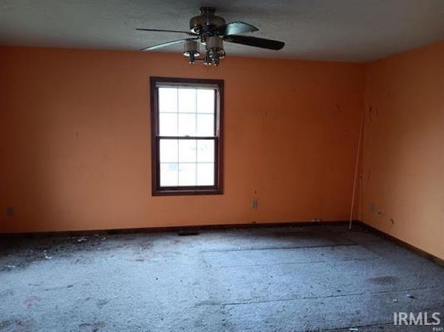 503 S Leavitt St, Brazil, IN 47834 - carpeted spare room with ceiling fan and baseboards