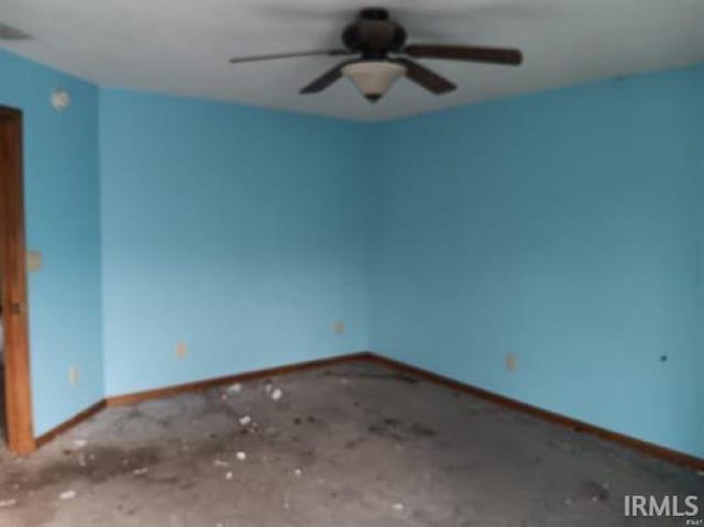 503 S Leavitt St, Brazil, IN 47834 - spare room featuring baseboards and ceiling fan