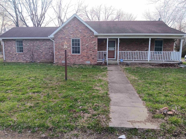 503 S Leavitt St, Brazil, IN 47834 - ranch-style home featuring covered porch, brick siding, and a front yard