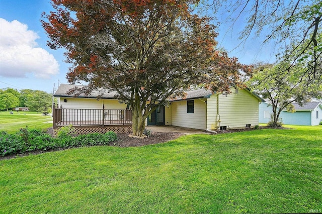 9820 Gerig Rd, Leo, IN 46765 - back of house with a lawn and a deck