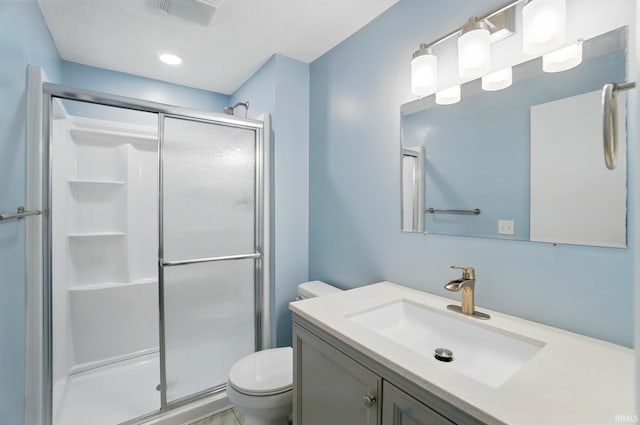 9820 Gerig Rd, Leo, IN 46765 - full bath featuring a stall shower, toilet, and vanity