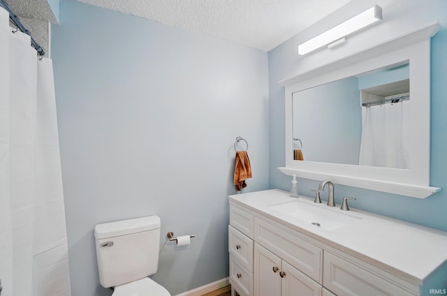 9820 Gerig Rd, Leo, IN 46765 - full bath with a textured ceiling, vanity, and toilet