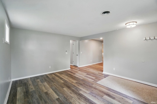 9820 Gerig Rd, Leo, IN 46765 - empty room with wood finished floors and baseboards