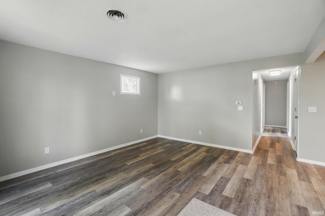 9820 Gerig Rd, Leo, IN 46765 - unfurnished room featuring dark wood-style flooring and baseboards