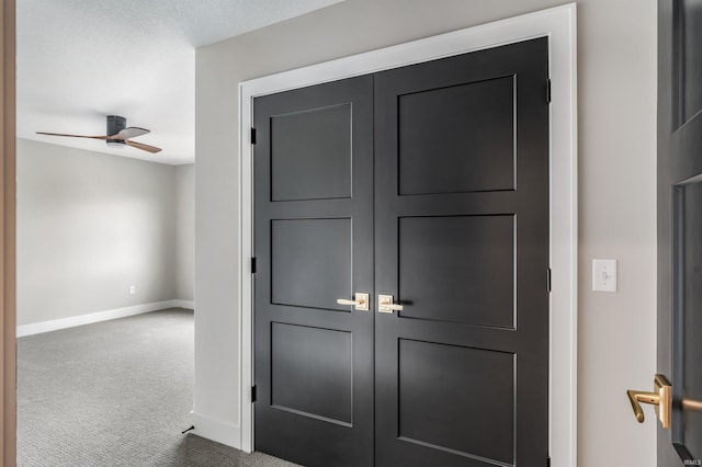 1256 Cascata Trl, Huntertown, IN 46748 - detailed view of carpet flooring, ceiling fan, and baseboards