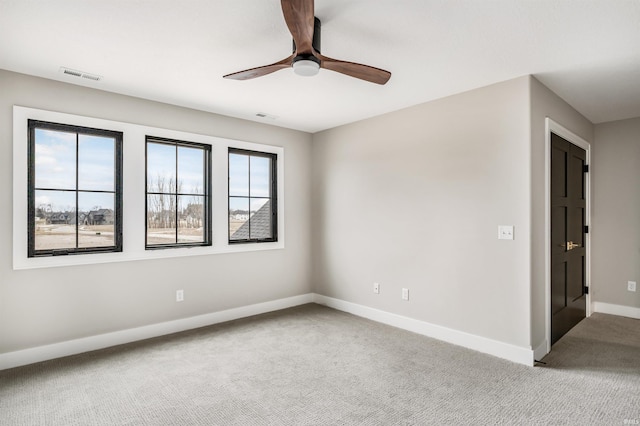 1256 Cascata Trl, Huntertown, IN 46748 - unfurnished room featuring carpet floors, a ceiling fan, and baseboards