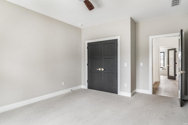 1256 Cascata Trl, Huntertown, IN 46748 - unfurnished bedroom featuring carpet flooring, baseboards, and a ceiling fan