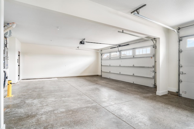 1256 Cascata Trl, Huntertown, IN 46748 - garage featuring a garage door opener